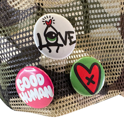 Loveville “HUMAN” Trucker Hat – Camo